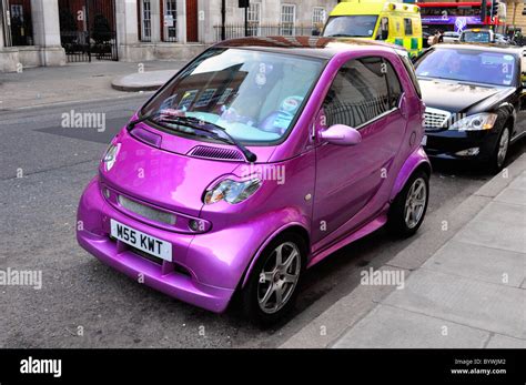 Pink Smart Car Stock Photo Alamy
