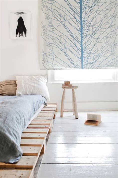 We love the bohemian look of this bedroom! 15 Simple DIY Bed Frames With Pallet Boards | HomeMydesign
