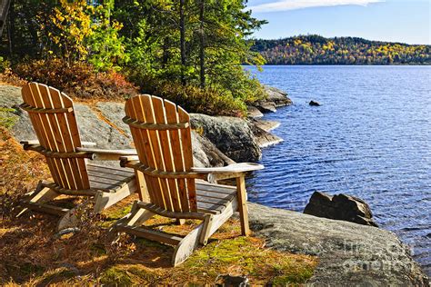 Adirondack Chairs At Lake Shore Photograph By Elena Elisseeva