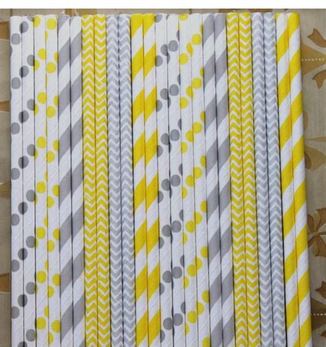 Yellow And Gray Striped Paper Straws Are Lined Up