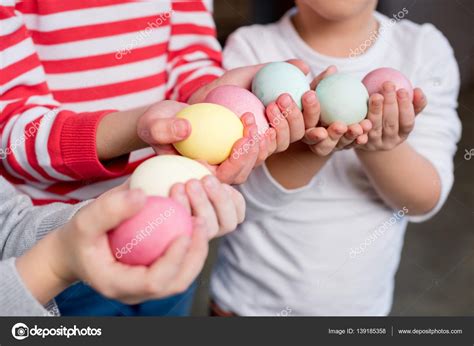 Kids Holding Easter Eggs — Stock Photo © Natashafedorova 139185358