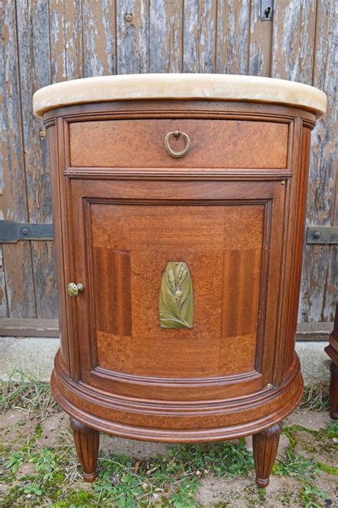 A gorgeous pair of petite french provincial louis xv style nightstands or end tables france, circa 1940s mahogany, with burl wood drawer fronts, satinwood. Pair of French Art Deco Mahogany Bedside Tables ...
