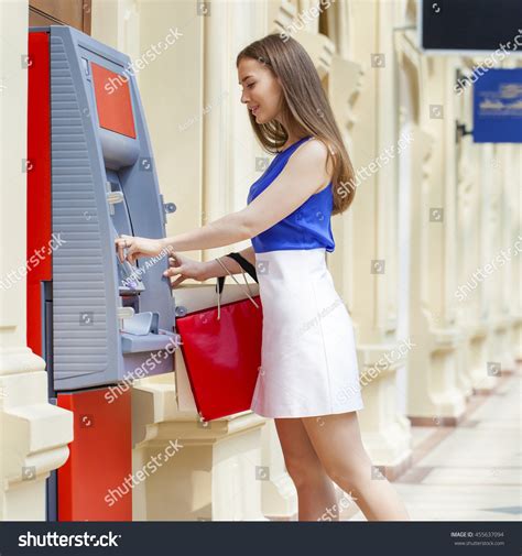 Young Happy Brunette Woman Withdrawing Money Stock Photo 455637094