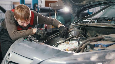 The car maintenance industry requires many types of skills from apprentices these days. Mechanic checks automobile engine, car repair, working in ...