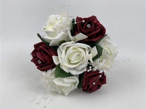 These blooms look just like the real thing, but with one major difference: Small Artificial Wedding Flowers Bridesmaid Bouquet Posy Ivory