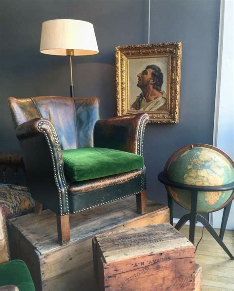It has wide both a seat and a back, sloped arms. Leather armchair seat reupholstered with green velvet ...