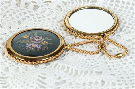 Premium Photo Two Vintage Brass Hand Mirror