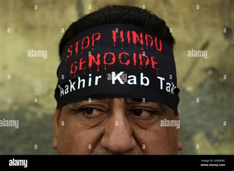 a kashmiri pandit or hindu participates in a protest demanding justice for the exodus of