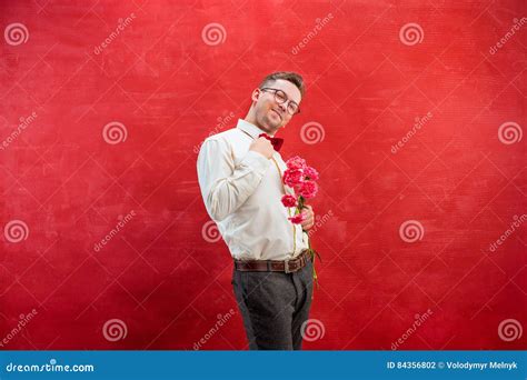 Young Beautiful Man With Flowers Stock Photo Image Of Celebration