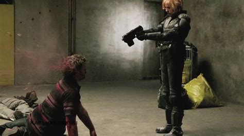 Olivia Thirlby Shoots Out The Back Of A Guy’s Head In New Images From Dredd Heyuguys