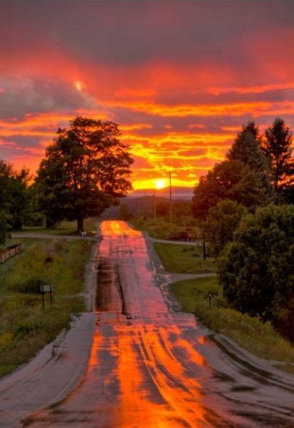Wet Country Road At Sunset Beautiful Landscapes Beautiful Nature