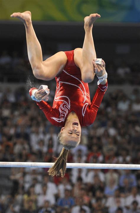 Nastia Liukin Dismounts The Uneven Bars Whoa Gymnastics Photos Artistic Gymnastics Female