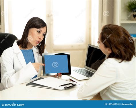 Smiling Woman Doctor Specialist Having Consultation Using Digital