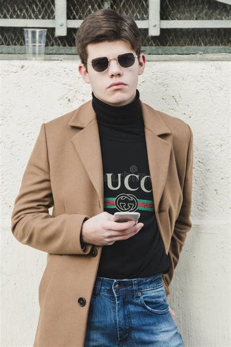 fashionable man posing at milan men`s fashion week editorial image image of show outfit