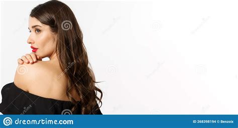 Fashion And Beauty Concept Elegant Woman Leaning On Shoulder And Gazing Aside With Sensual