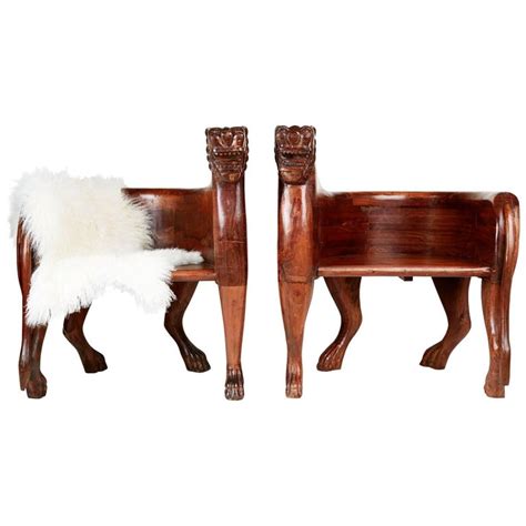 The perfect bed furniture with strong and elegant designs that reflects the tradition yet modern furniture. Figural Full Body Carved Teak Wood Lioness Club Chairs, Pair at 1stdibs