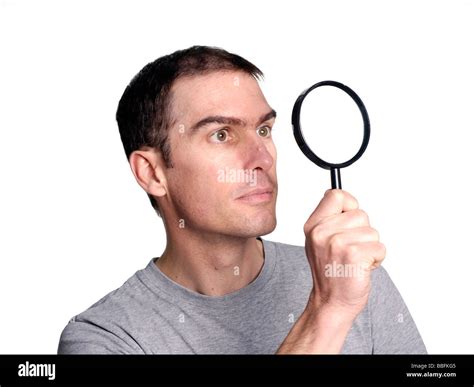 Man Looking Through Magnifying Glass Stock Photo Alamy