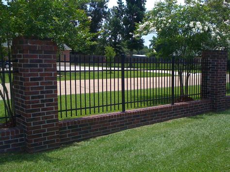 Wrought Iron Fencing With Brick Border Backyard Fences Fence Design