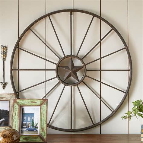 Wagon wheels can also make beautiful indoor decorations. Wagon Wheel Decor | Wayfair