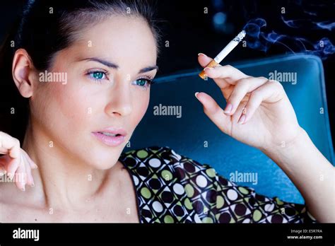 Woman Smoking A Cigarette Stock Photo Alamy