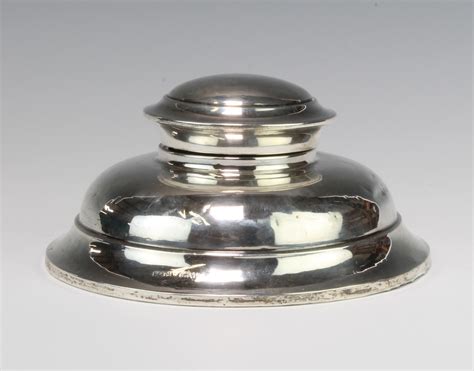 A Circular Silver Capstan Inkwell Of Plain Form 15th August 2018
