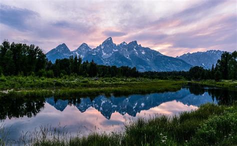 Mountains Reflected On The Snake River At Sunset Grand Tetons National