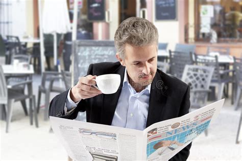 Businessman Reading A Newspaper Stock Image Image Of Businessman