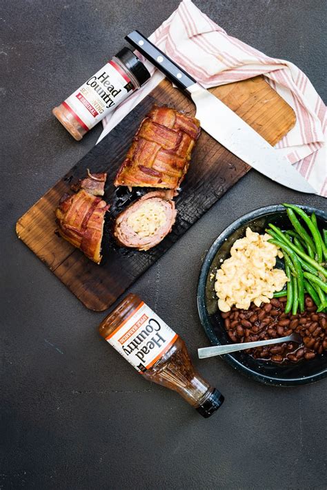 The prolonged exposure to smoke allows the meat to take on a smokey flavor, giving it a tasted that can't be matched any other way. Smoked Bacon Wrapped BBQ Fatty Recipe | GirlCarnivore.com