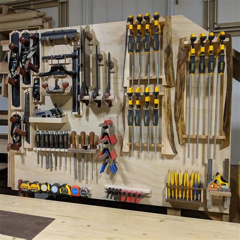 Clamp racks added to complete the tool wall Click to see the DIY for