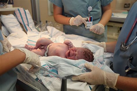 Just Born Baby Boy With Umbilical Cord Stock Photo Download Image Now