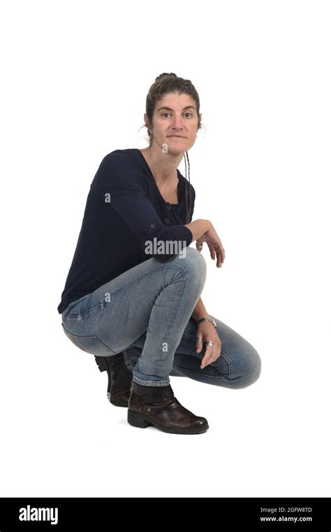 pretty woman crouching on floor cut out stock images and pictures alamy