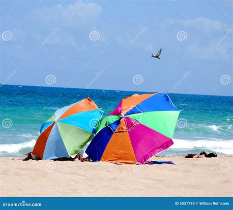 Beach Umbrellas Made Of Straw At Blue Sky Background Royalty Free Stock