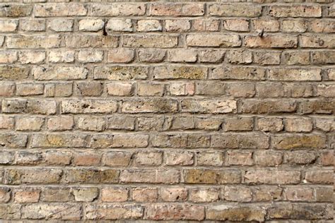 Texture Of An Old Light Brick Stone Wall Background Stock Image