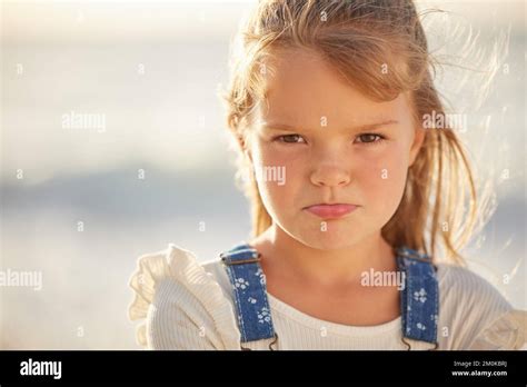 Blonde Caucasian Little Girl With Pouted Lips Looking Angry Annoyed