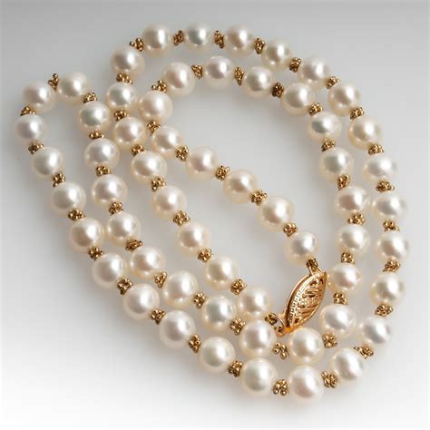 When you look up versatility' in the dictionary, there should be a picture of this gold bead station necklace next to the definition! 18 Inch Cultured Saltwater Pearl Bead Necklace 14K Gold Clasp
