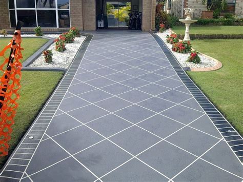 Until you have applied a layer of sealer, your concrete driveway won't be complete. Cover-It Resurfacing | Front garden ideas driveway, Garden ...