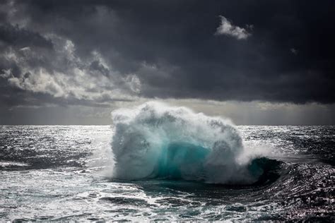 New Photographs Of Waves Crashing Against The Setting Sun By Warren