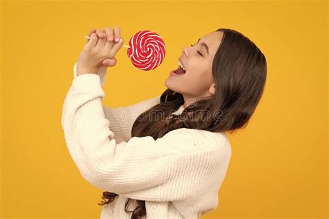 Excited Face Teenage Girl With Candy Lollipop Happy Child 12 13 14