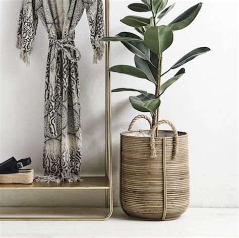 Rattan baskets sold by muji are made in thai binh province, northern vietnam. Large Rattan Baskets | Rattan basket, Planter pots indoor ...