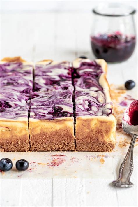 These Blueberry Swirl Cheesecake Bars Are Exceptionally Thick And
