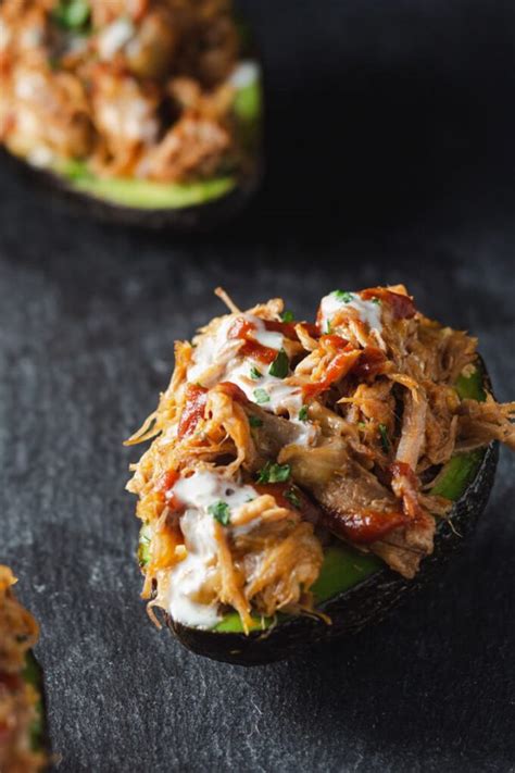 Using a slow cooker, place the pork shoulders and cook for 6 hours on low heat or 4 hours on high heat. Pulled Pork Stuffed Avocado Boats Recipe (Keto) | Low Carb ...