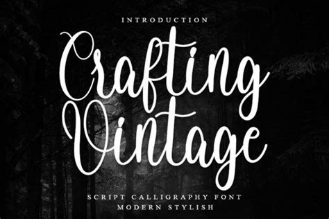 The Crafting Vintage Script Is Displayed In Black And White With Trees