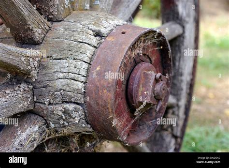 An old cart wheel hub Stock Photo - Alamy