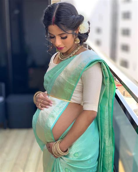 Image May Contain One Or More People And People Standing Maternity Photoshoot Outfits Indian