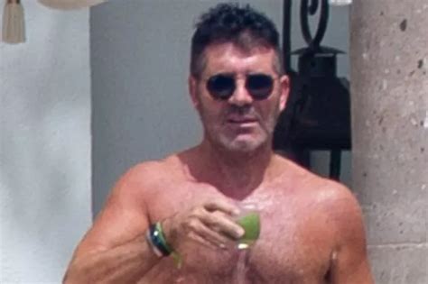 Simon Cowell Shows Off Ripped Torso In Swimming Trunks After Two Stone