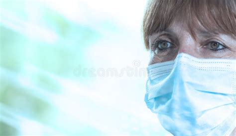 mature woman wearing a medical face mask light effect stock image image of face infection