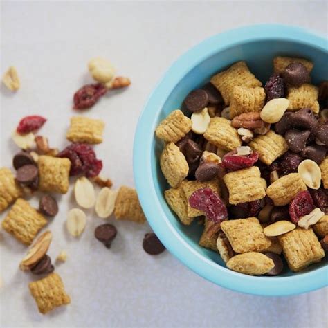 Fiber benefits your diet as it supports healthy digestion. Homemade trail mix with high fiber cereal, dried fruit ...