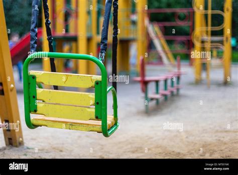 Empty Swings On The Playground Stock Photo Alamy
