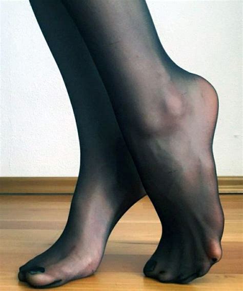 Women`s Legs And Feet In Tights Legs And Feet In Black And White Tights 51 A Focus On Feet