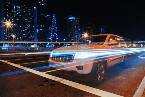 Long Exposure Of Moving Cars On Night Road In Dubai Stock Photo Image